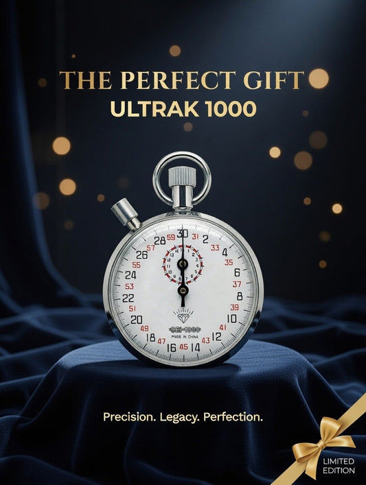 Stopwatch on a dark blue fabric background with 'ULTRAK 1000' branding.