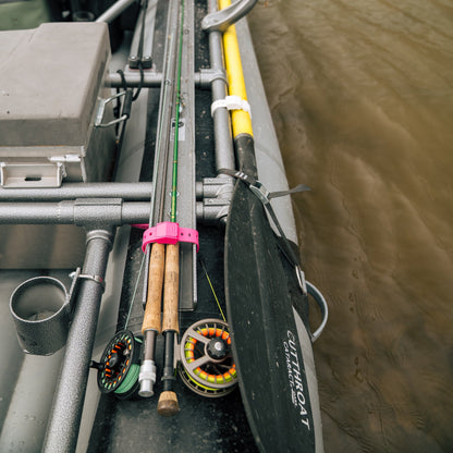 Fishing equipment on a boat with a blurred water background