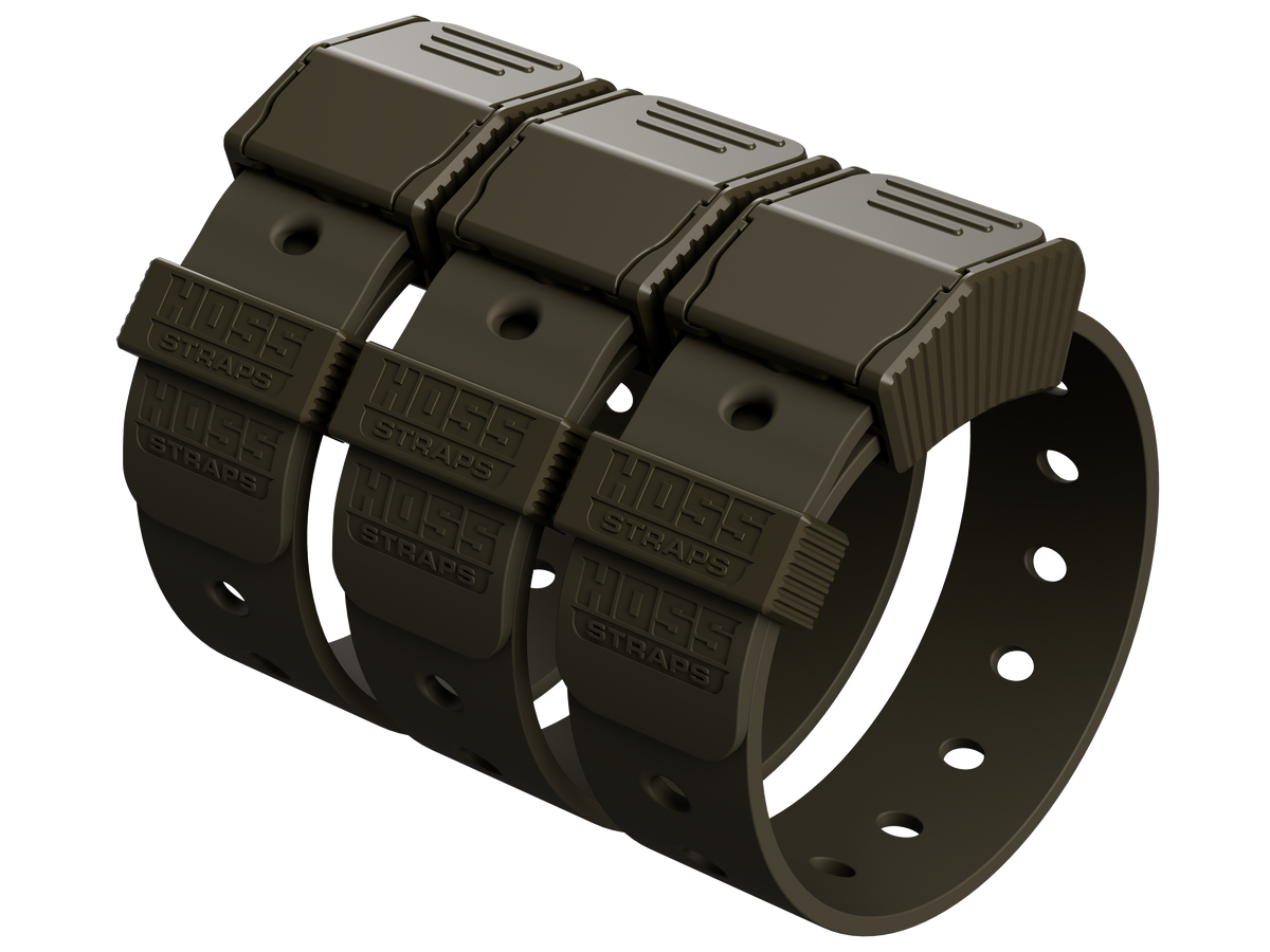 Black plastic strap with multiple clips on a white background