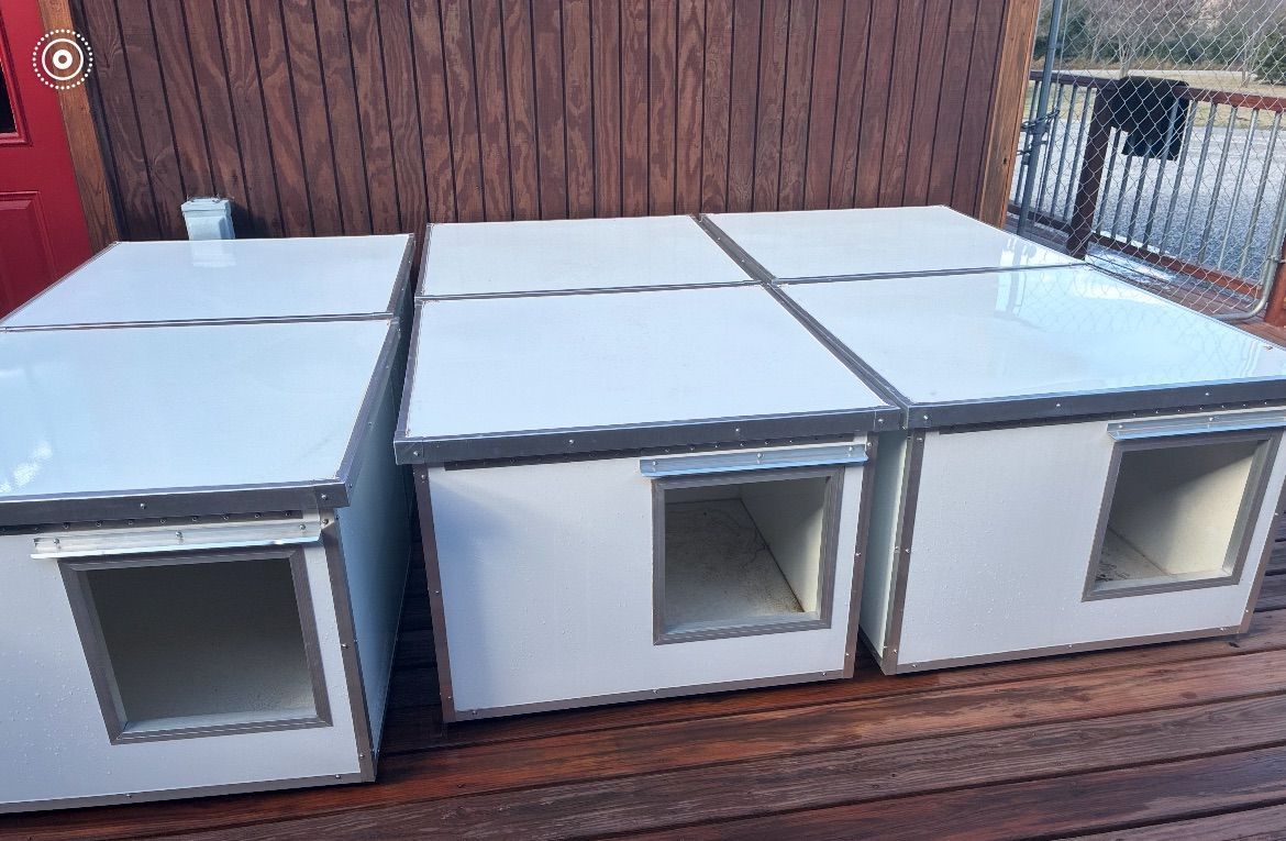 group of large insulated dog houses